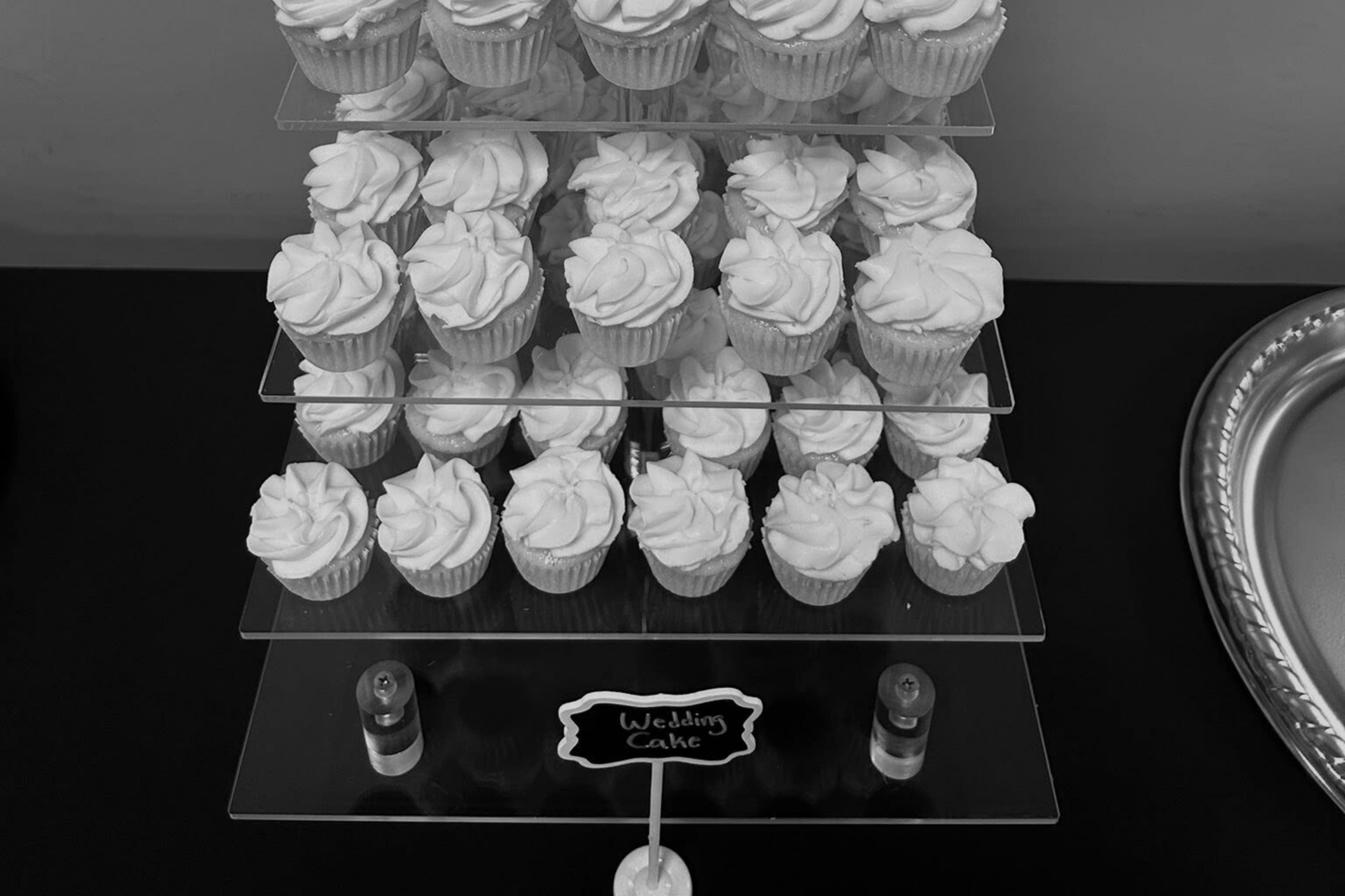 rack of wedding cake cupcakes