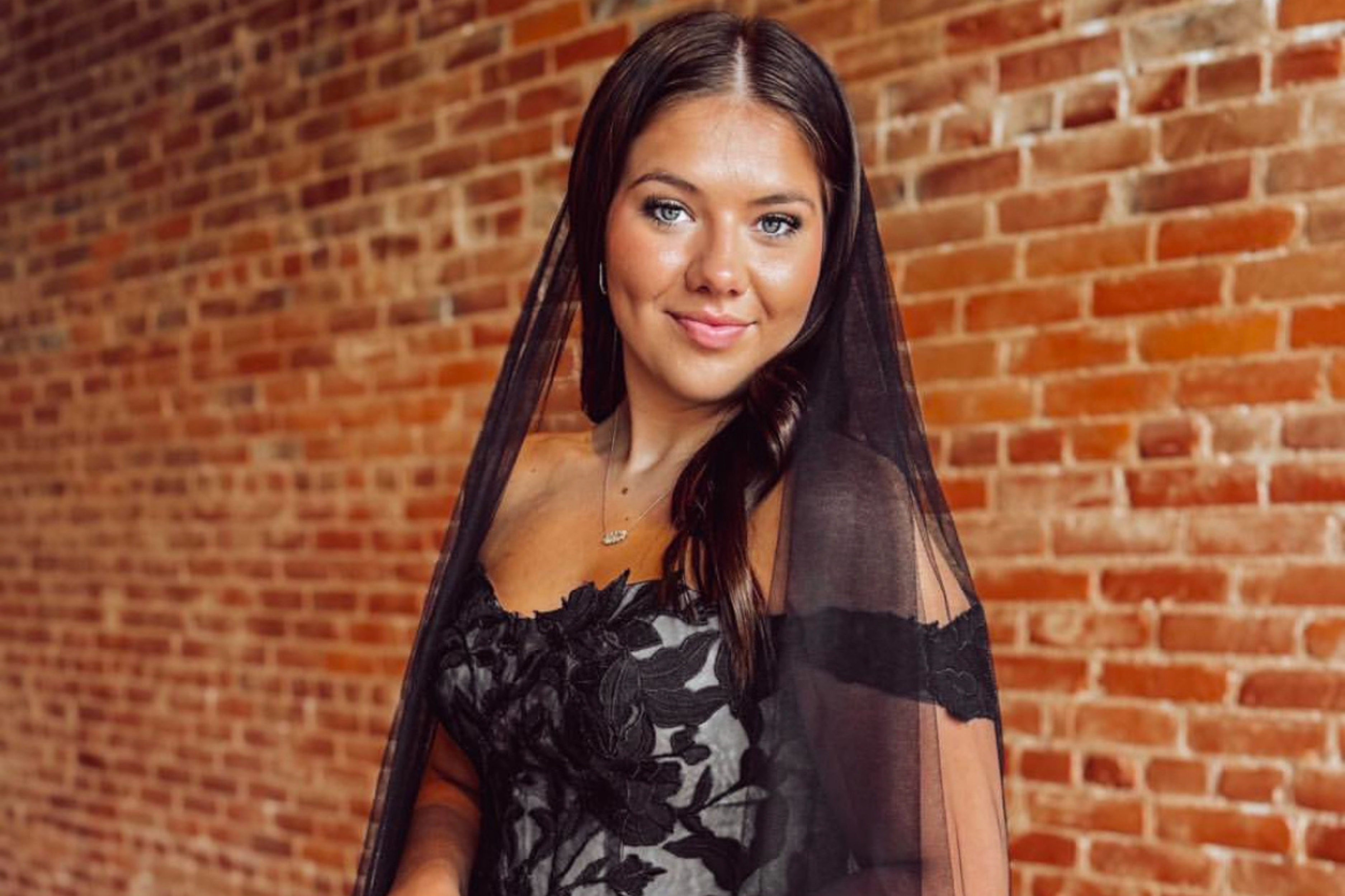 model in a black wedding dress