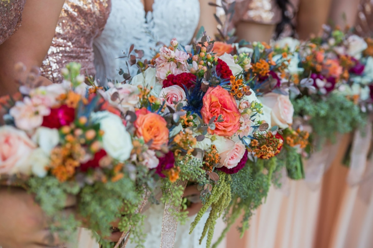 bride and bridesmaids holding bouquets