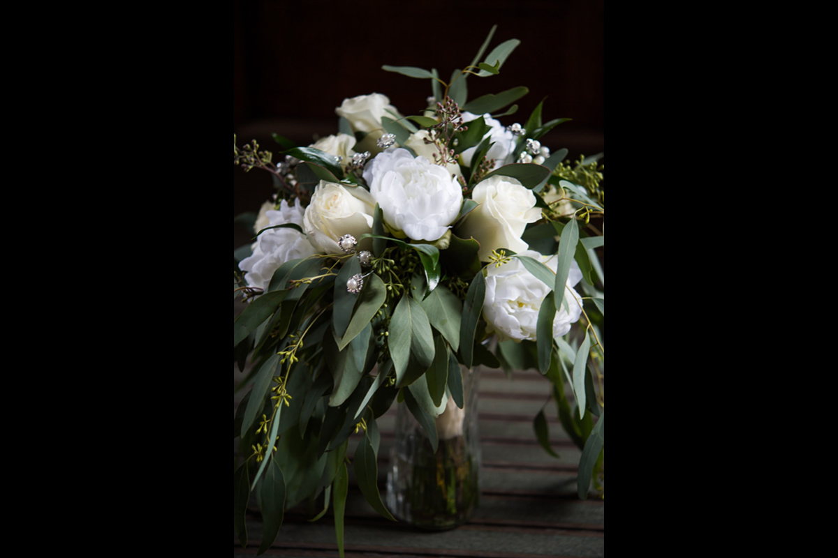 a wedding floral arrangement with white flowers