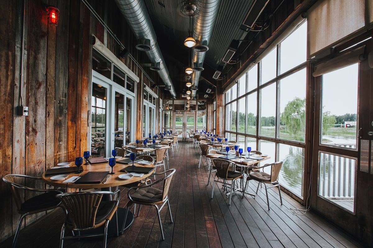 room at Firefly Grill with a view of the pond through the windows