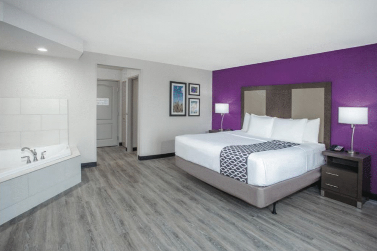 king jacuzzi tub bedroom inside La Quinta Inn and Suites