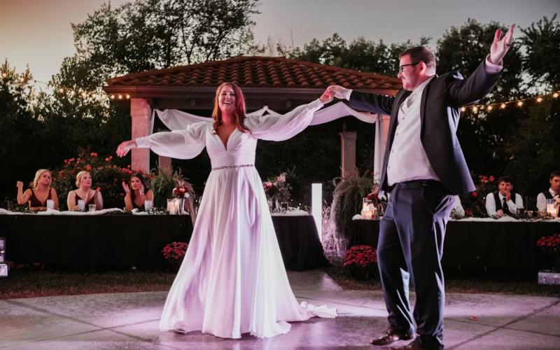 bride and groom dancing on an outdoor dance floor
